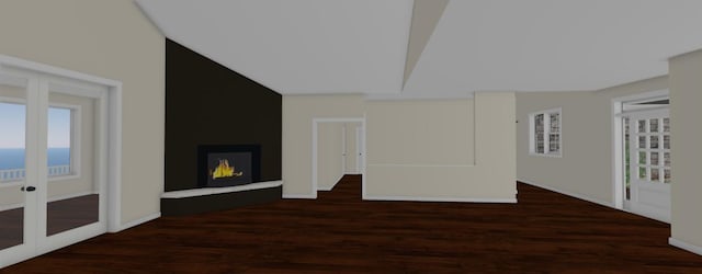 unfurnished living room featuring lofted ceiling, dark hardwood / wood-style floors, and a large fireplace