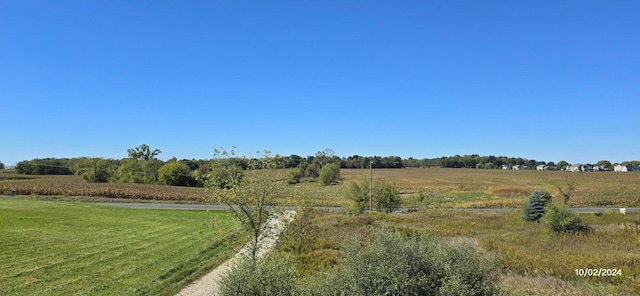 exterior space with a rural view