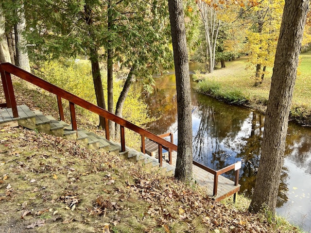 view of dock with a water view