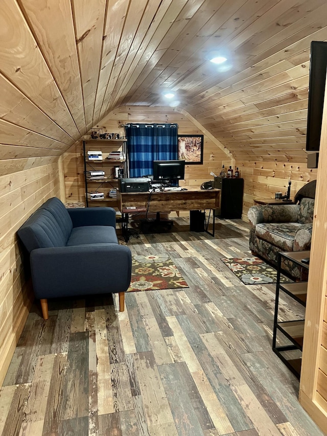 office featuring hardwood / wood-style floors, lofted ceiling, wood walls, and wooden ceiling