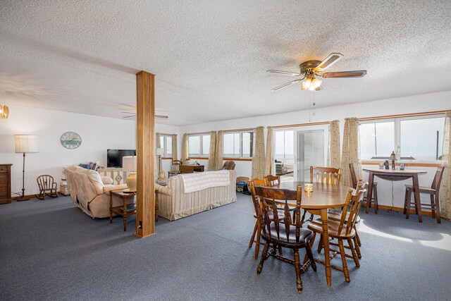 dining space with ceiling fan, plenty of natural light, and carpet