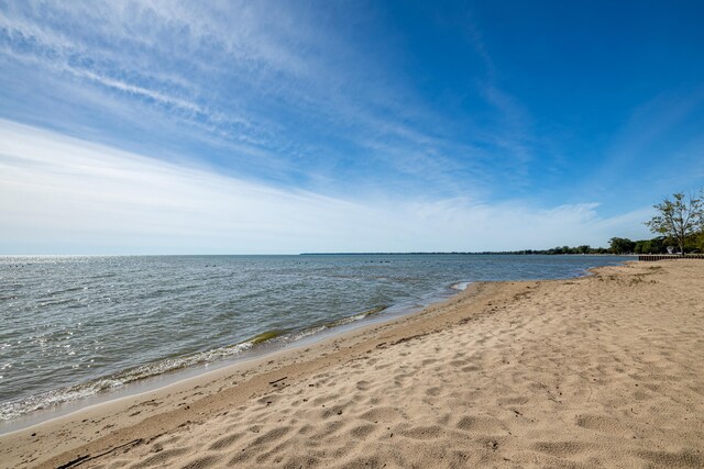 property view of water featuring a view of the beach