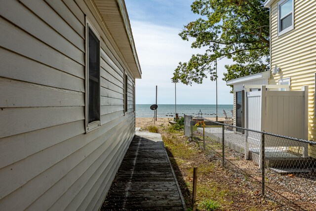 view of home's exterior featuring a water view