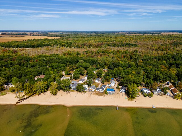 drone / aerial view with a view of the beach and a water view