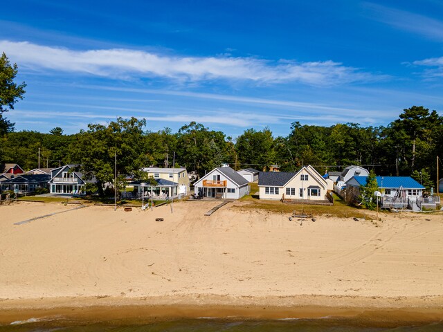 view of front of house featuring a water view