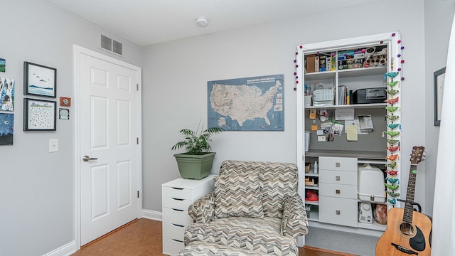 living area with carpet