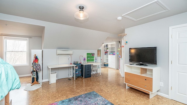 bedroom featuring a wall mounted AC and lofted ceiling