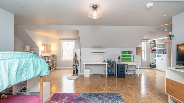 bedroom with a wall mounted air conditioner