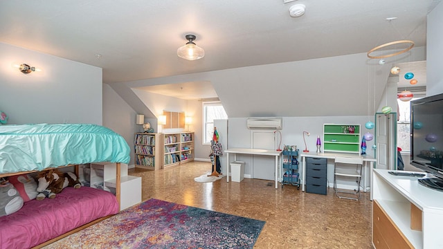 bedroom featuring a wall unit AC