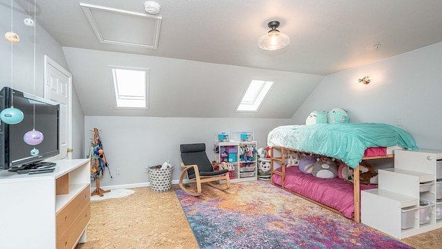 bedroom with vaulted ceiling and carpet floors