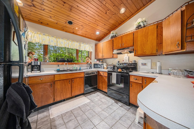 kitchen featuring lofted ceiling, wood ceiling, black appliances, light tile patterned flooring, and sink