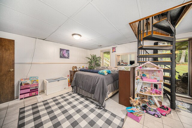 bedroom featuring tile patterned floors