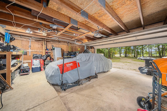 garage featuring a garage door opener