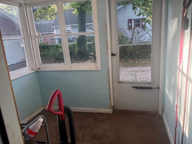 unfurnished sunroom with plenty of natural light