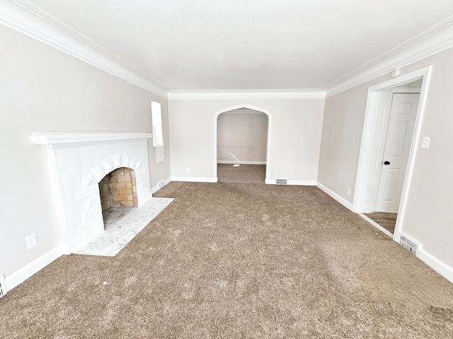 unfurnished living room with crown molding and carpet flooring