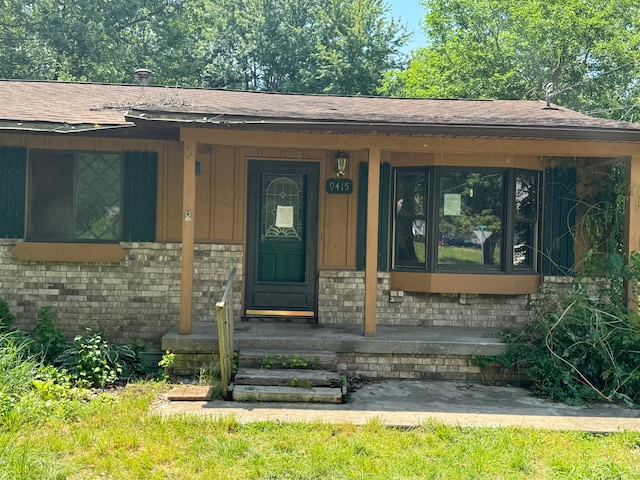 entrance to property with a porch