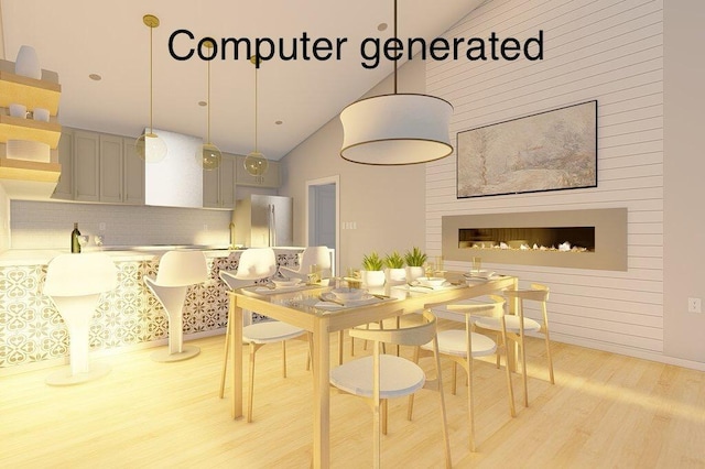 dining area featuring light hardwood / wood-style flooring and vaulted ceiling