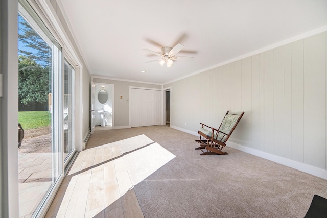 unfurnished room with ceiling fan and ornamental molding