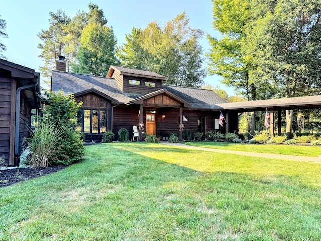 view of front of home with a front yard