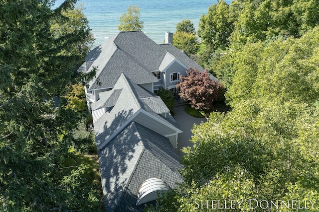 birds eye view of property featuring a water view