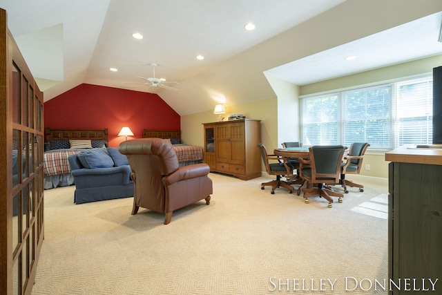 carpeted cinema room featuring ceiling fan and lofted ceiling