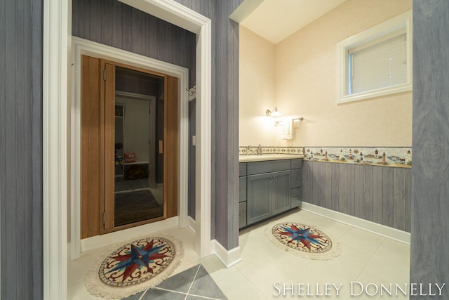 bathroom with vanity and tile patterned floors