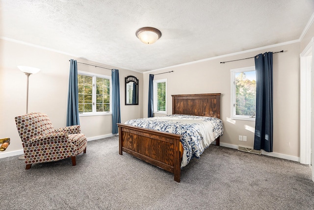 carpeted bedroom featuring a textured ceiling, multiple windows, baseboards, and crown molding