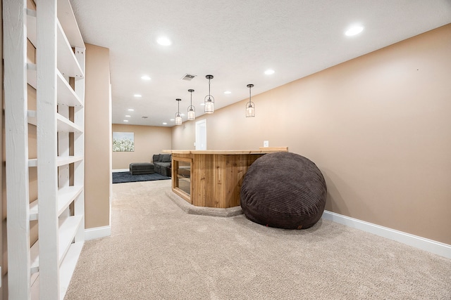 bar featuring light carpet, a dry bar, baseboards, visible vents, and recessed lighting