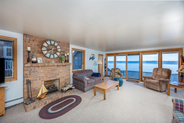 carpeted living room featuring a brick fireplace, a baseboard heating unit, and a water view