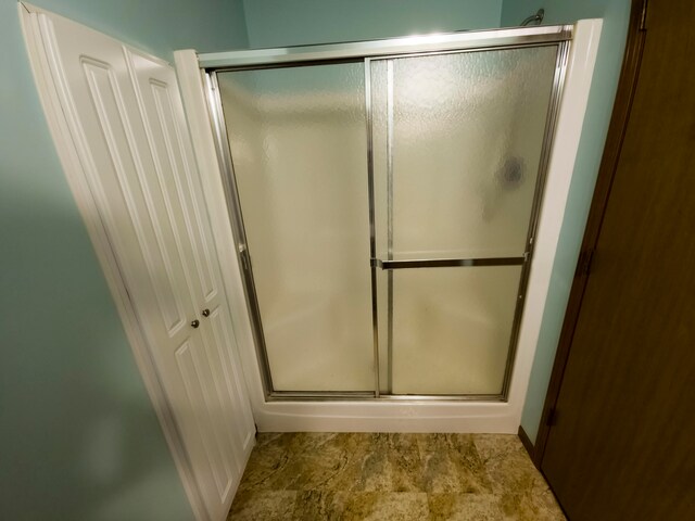 bathroom featuring walk in shower