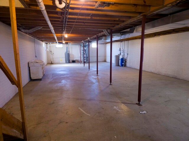 basement featuring water heater