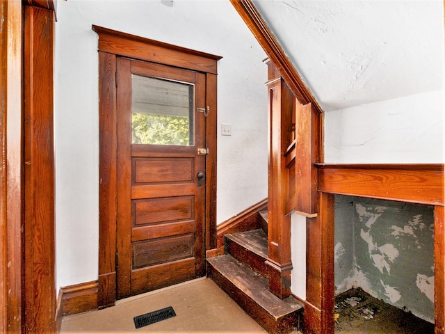 interior space featuring vaulted ceiling