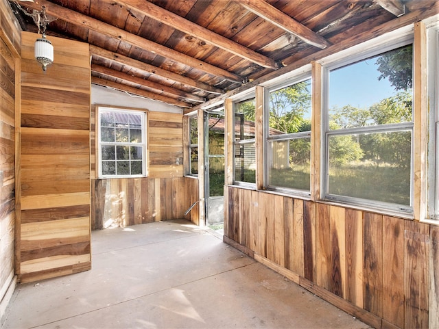 unfurnished sunroom with vaulted ceiling and wooden ceiling