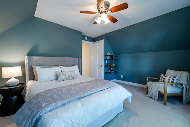 bedroom with light carpet, ceiling fan, and vaulted ceiling