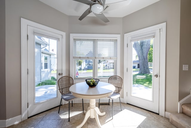 doorway with a wealth of natural light and ceiling fan