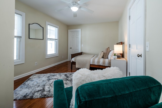 bedroom featuring dark hardwood / wood-style floors and ceiling fan