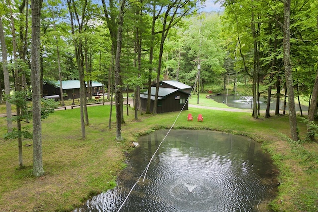 exterior space with a water view