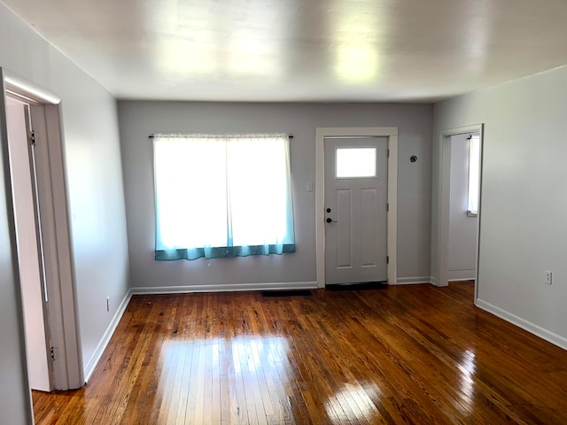 foyer featuring dark hardwood / wood-style floors