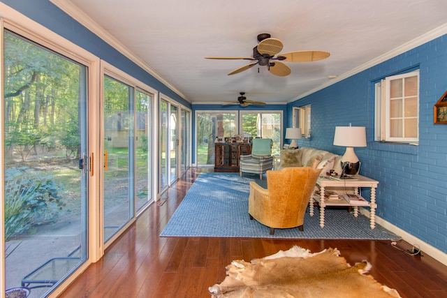 sunroom / solarium with ceiling fan