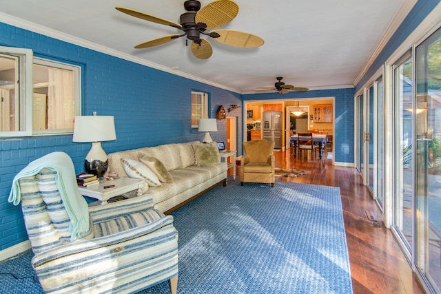 sunroom / solarium with ceiling fan