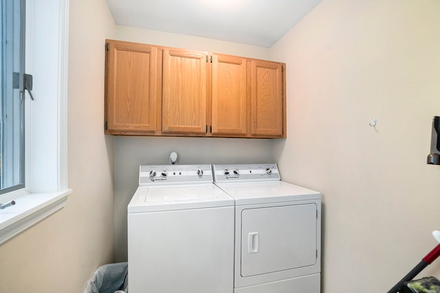 laundry area featuring cabinets and independent washer and dryer