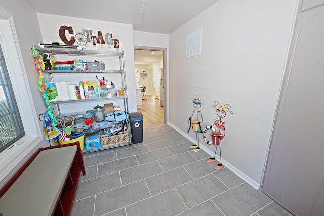 game room featuring tile patterned flooring