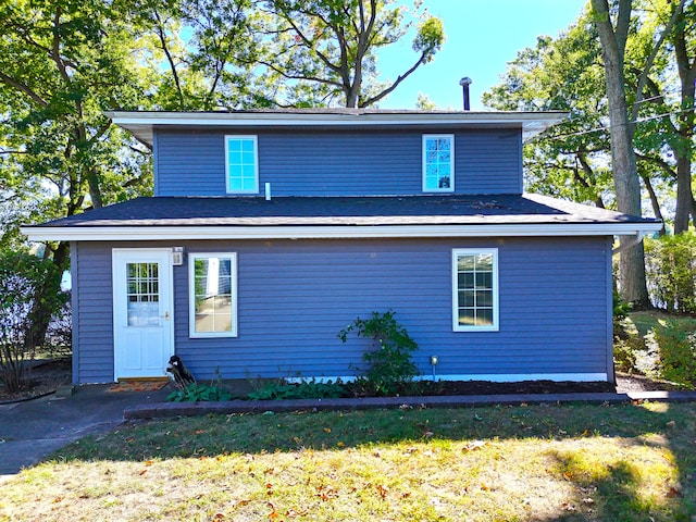 exterior space featuring a front lawn