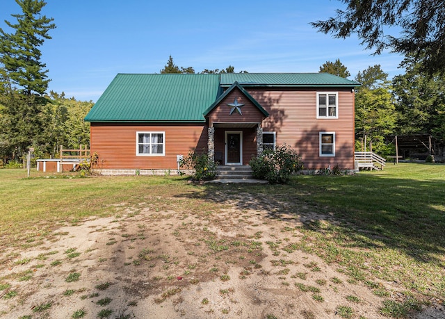 view of front of property featuring a front yard