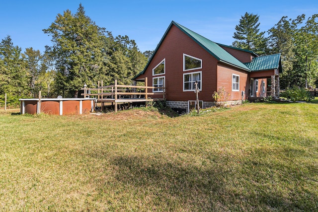 view of property exterior with a lawn