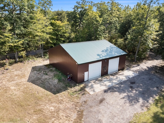 view of outbuilding featuring a garage