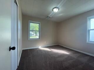 view of carpeted spare room