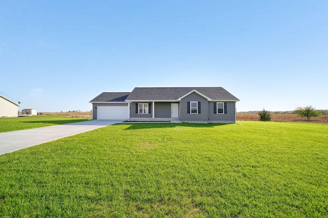 single story home with a garage and a front lawn