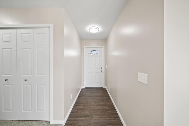 doorway to outside featuring dark hardwood / wood-style flooring