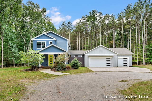 view of front of property featuring a garage and covered porch